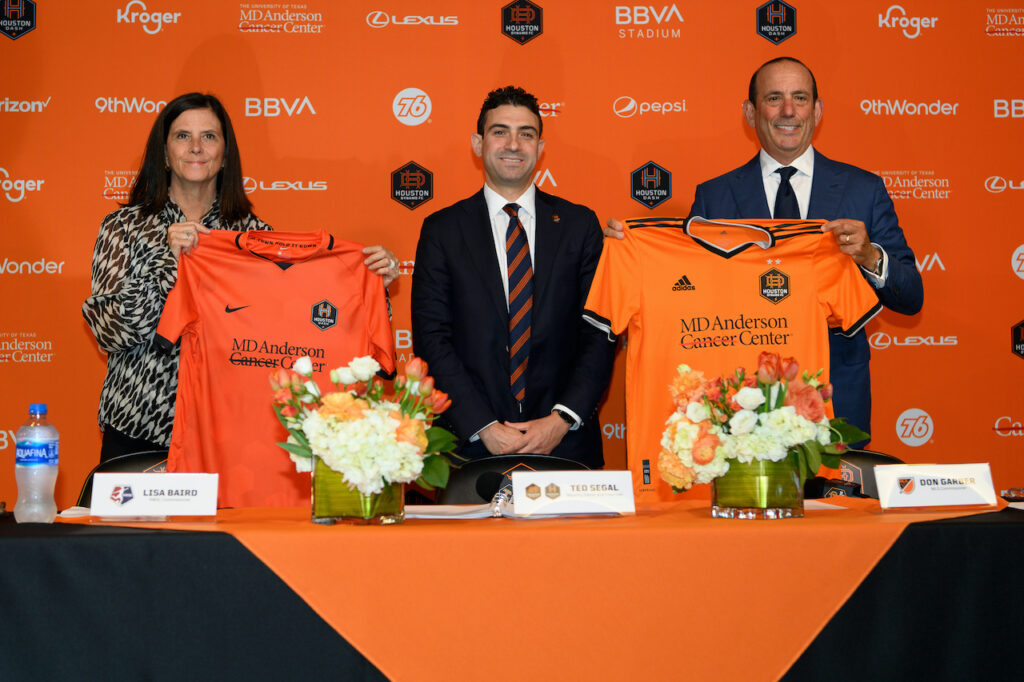 NWSL Commissioner Lisa Baird, Houston Dynamo FC and Dash owner Ted Seal, MLS commissioner Don Garber