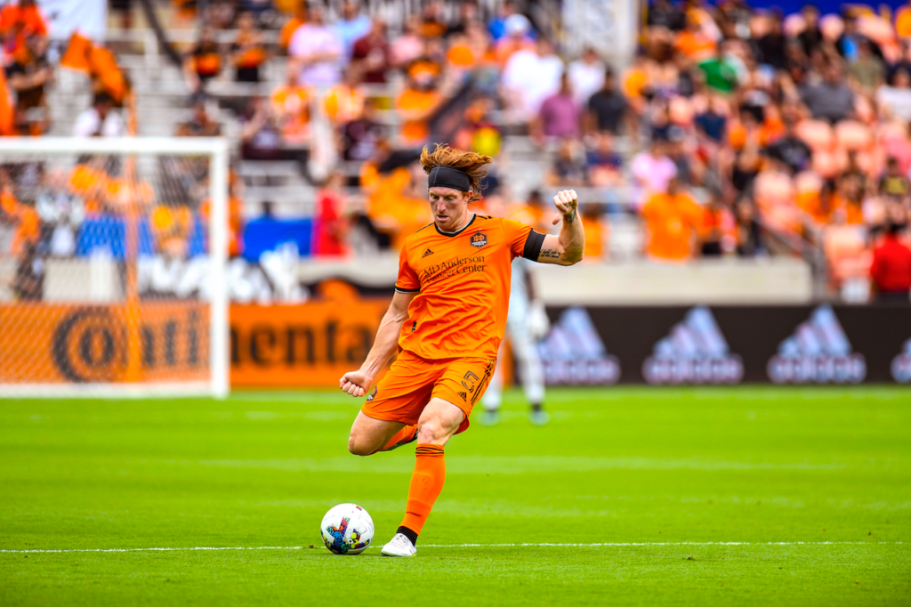 Tim Parker kicking a soccer ball